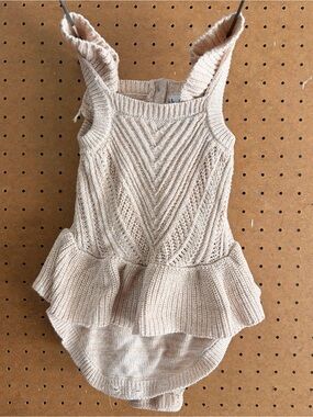 Nicole Miller Knit Peplum Baby Romper in Soft Beige